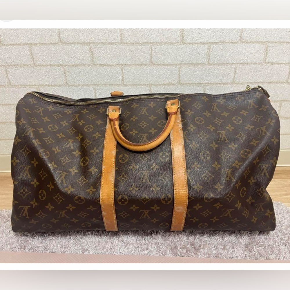Louis Vuitton keepall 50. No stains inside or rips in leather. Has wear